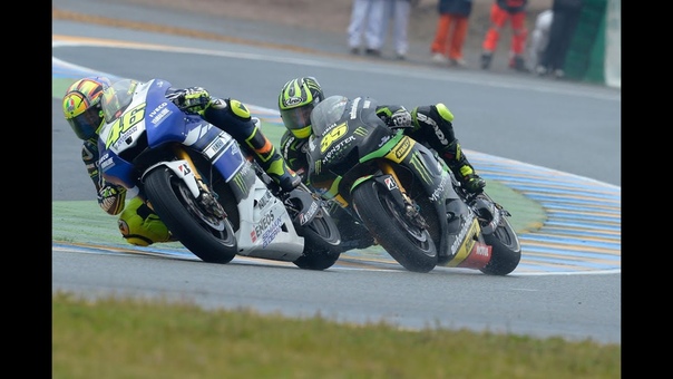 Cal Crutchlow charges at Le Mans Moto GP 2013 with Lewis Hamilton for